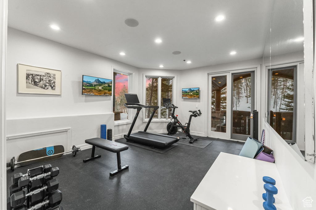 Workout room featuring french doors