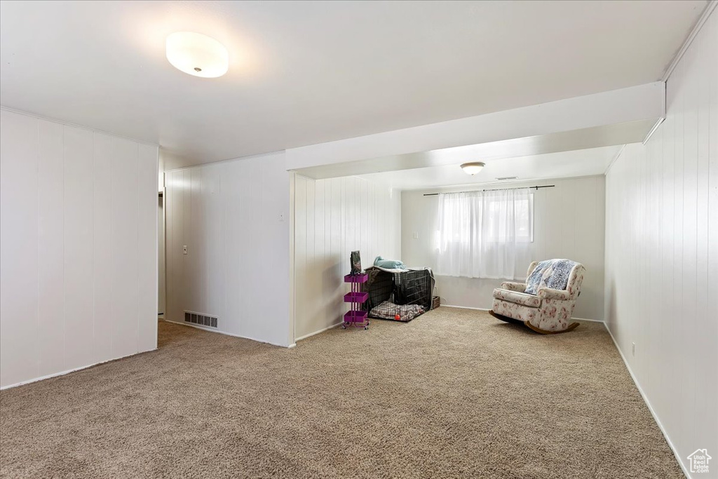 Living area with carpet flooring