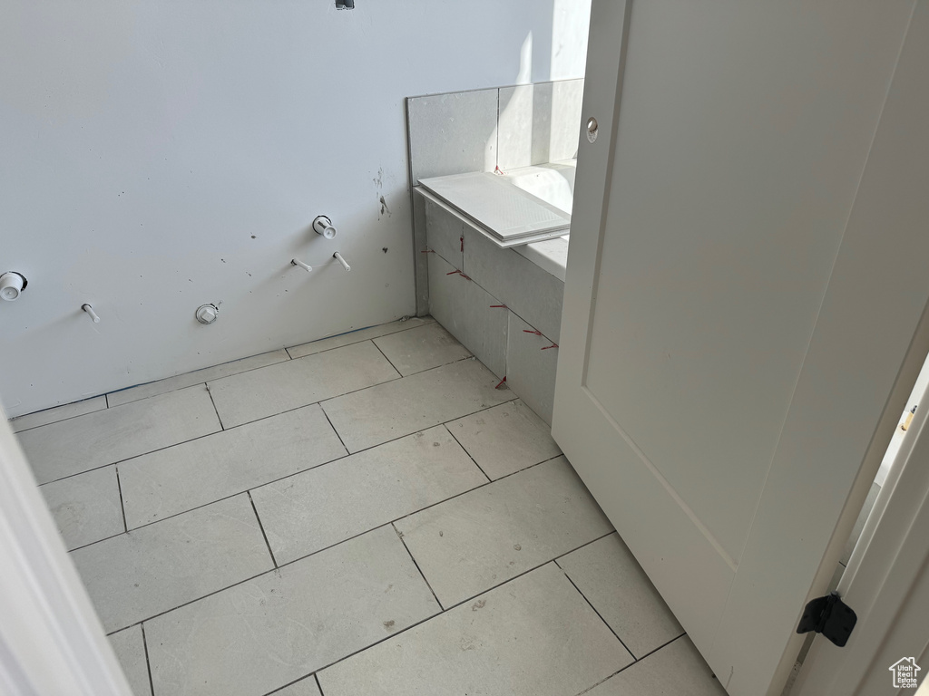 Bathroom with tile flooring