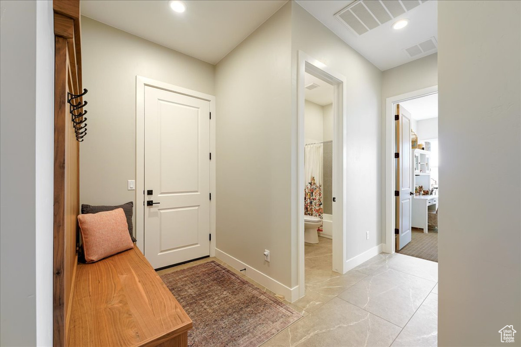 Interior space featuring light tile flooring