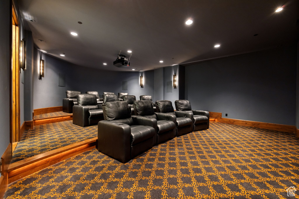Home theater room featuring carpet