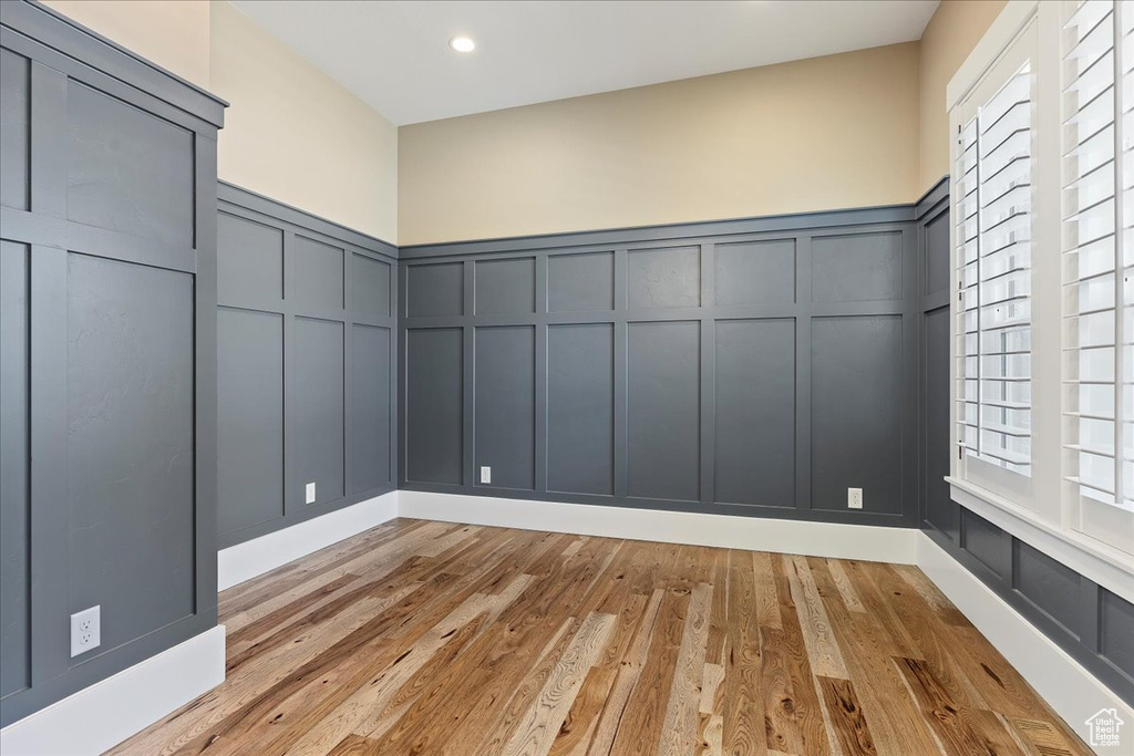 Unfurnished room with light hardwood / wood-style floors