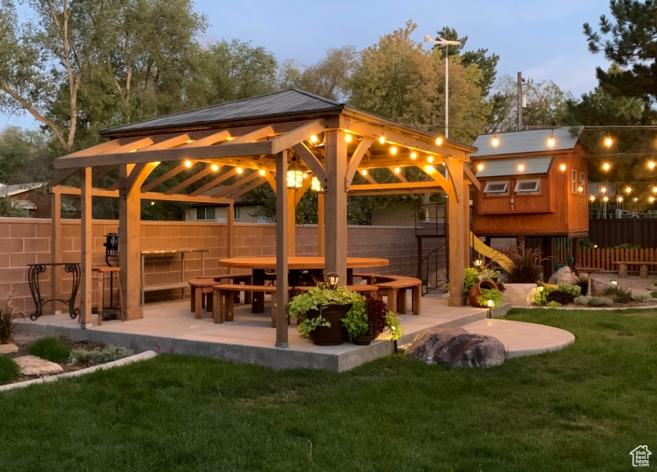 Exterior space featuring a gazebo and a patio