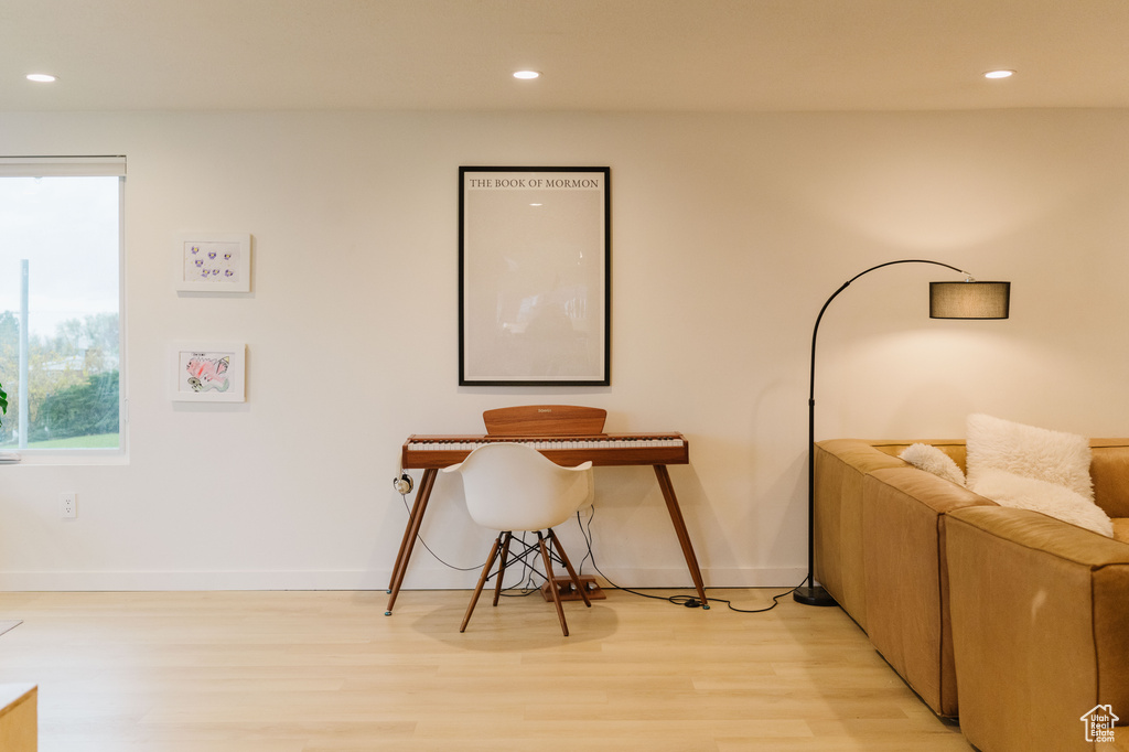 Home office featuring light hardwood / wood-style floors