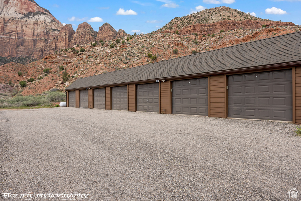 Garage featuring a mountain view