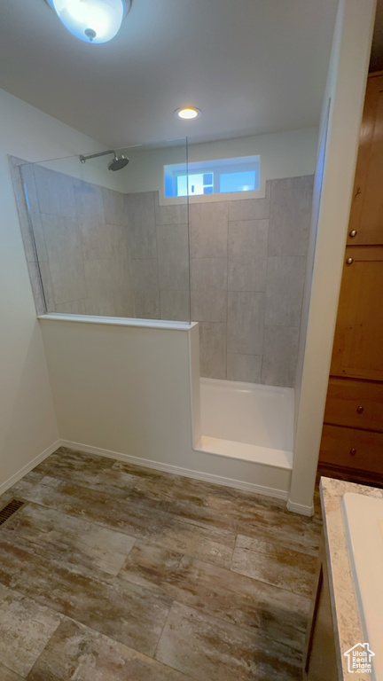Bathroom featuring tile floors
