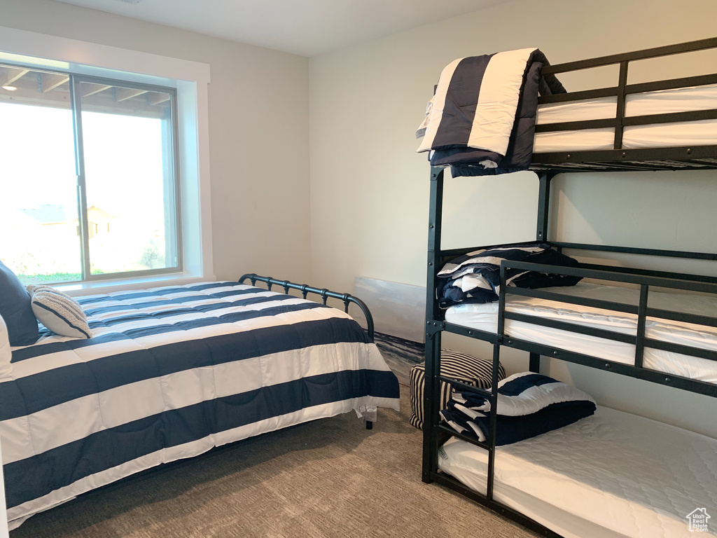 Bedroom featuring carpet flooring