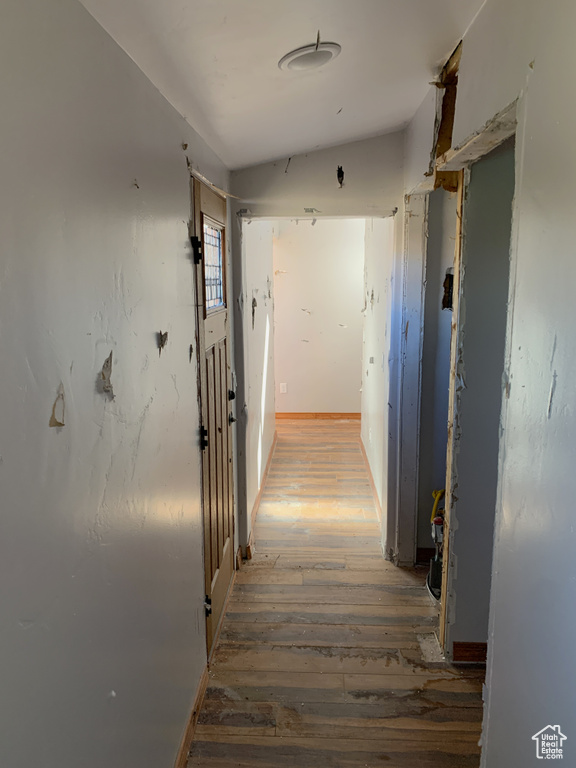 Hallway featuring dark hardwood / wood-style flooring