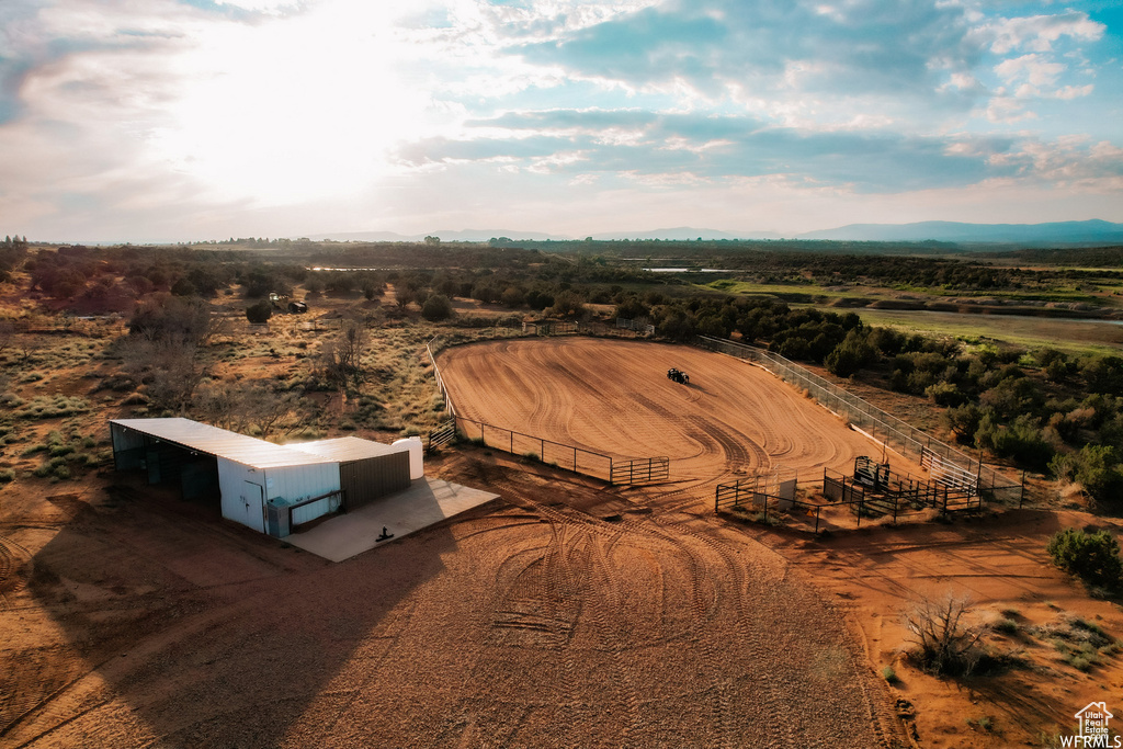 Birds eye view of property with a rural view