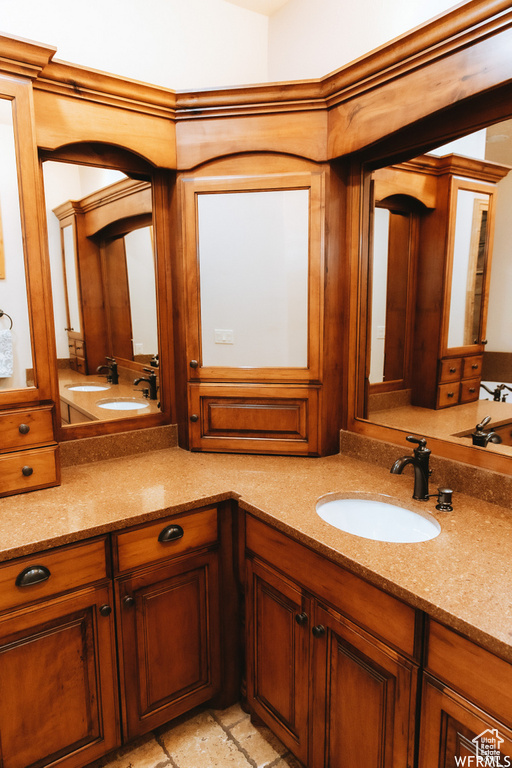 Bathroom featuring double sink vanity