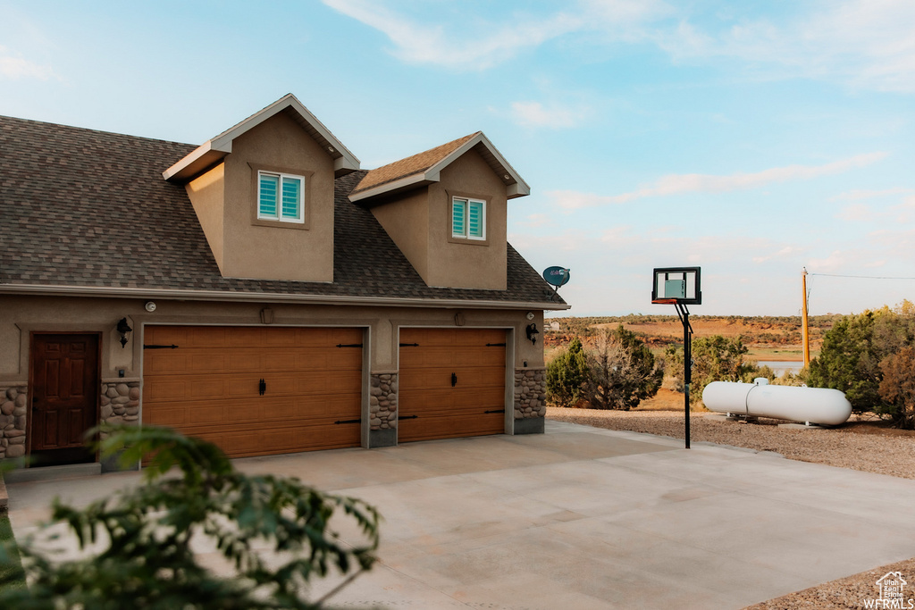 View of front of property with a garage