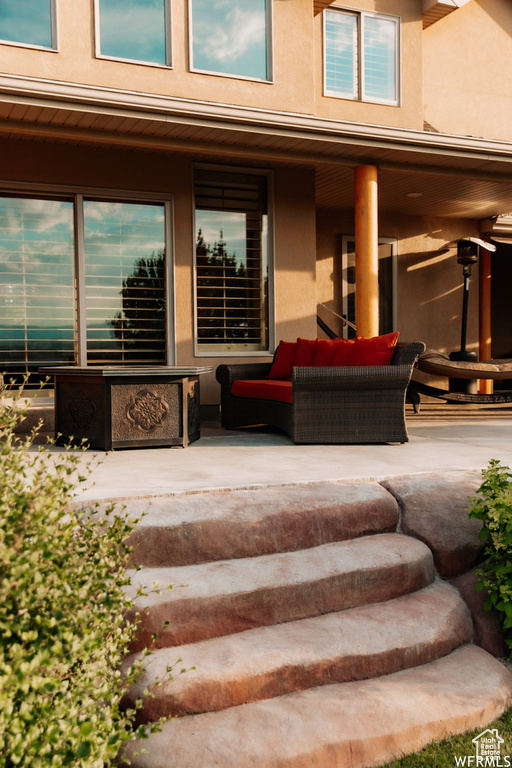 Exterior space with a patio area and an outdoor living space