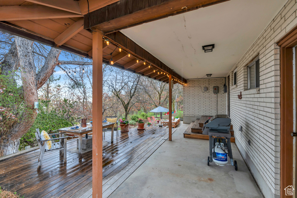 View of patio / terrace with a wooden deck and grilling area