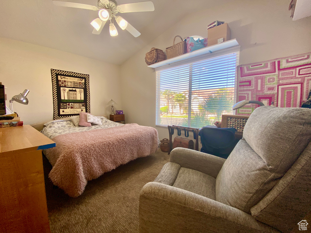 Bedroom featuring lofted ceiling and ceiling fan