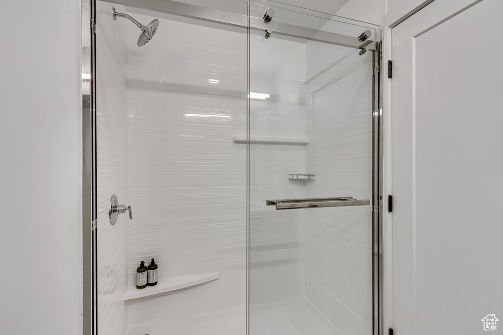 Bathroom with an enclosed shower