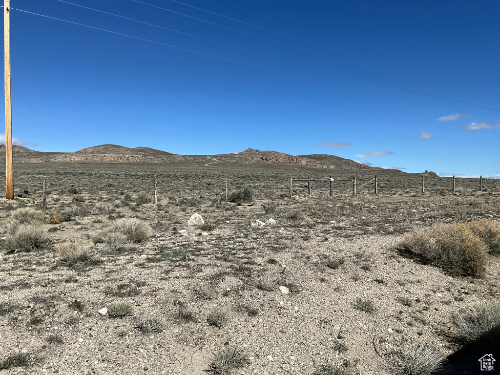 Property view of mountains featuring a rural view