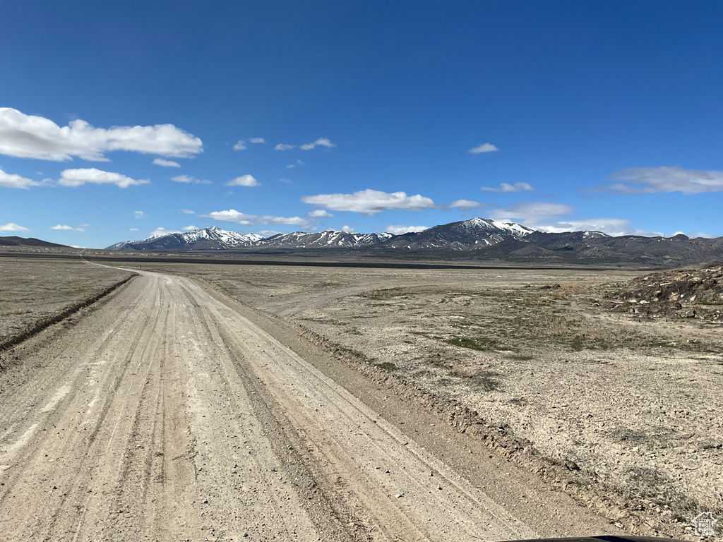 View of street featuring a rural view and a mountain view