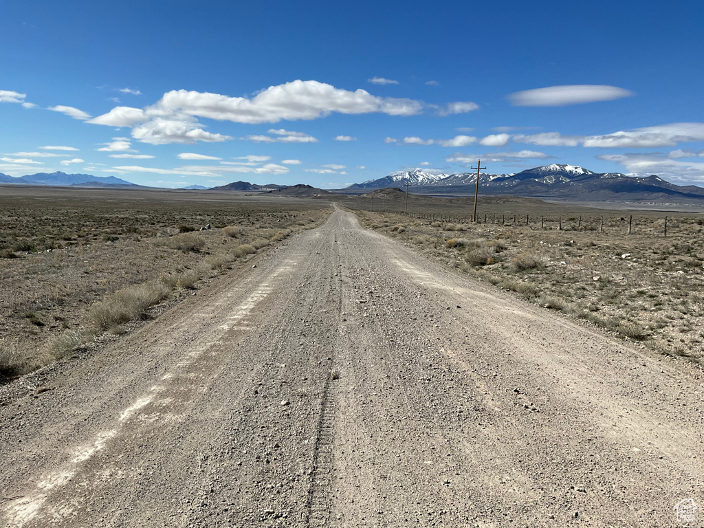 View of street featuring a mountain view and a rural view