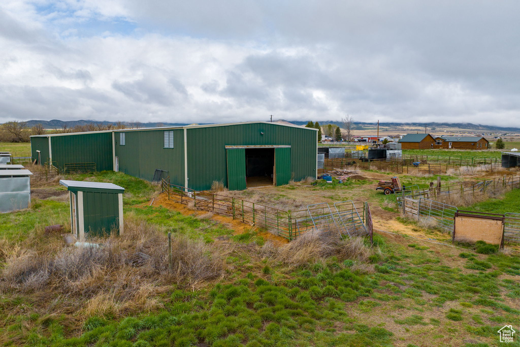 View of shed / structure featuring a rural view