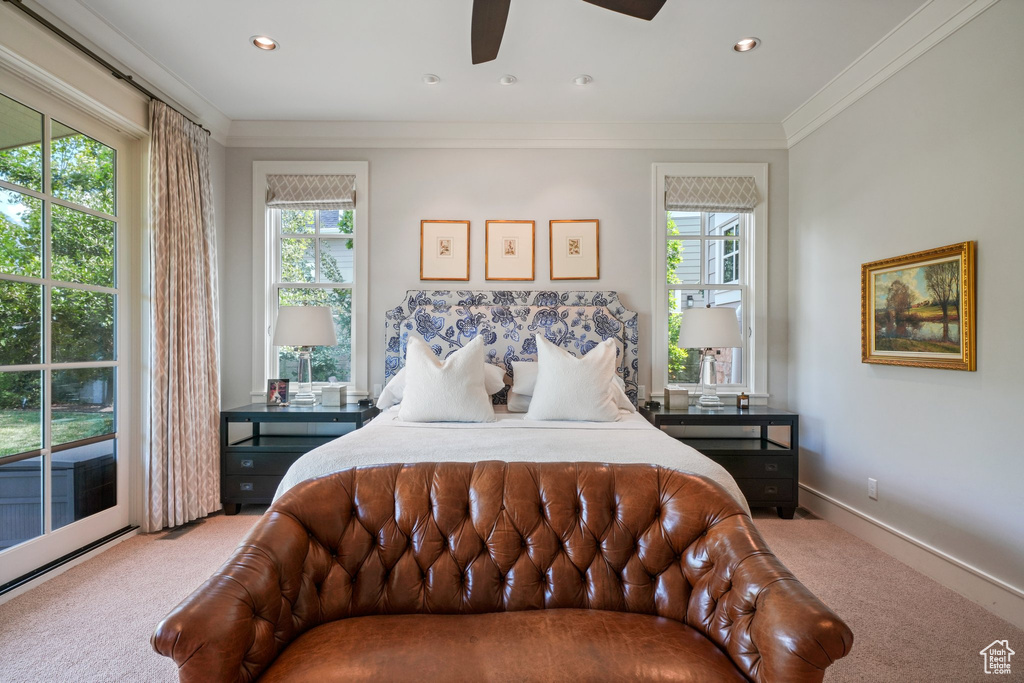 Bedroom featuring ceiling fan, crown molding, access to exterior, and carpet floors