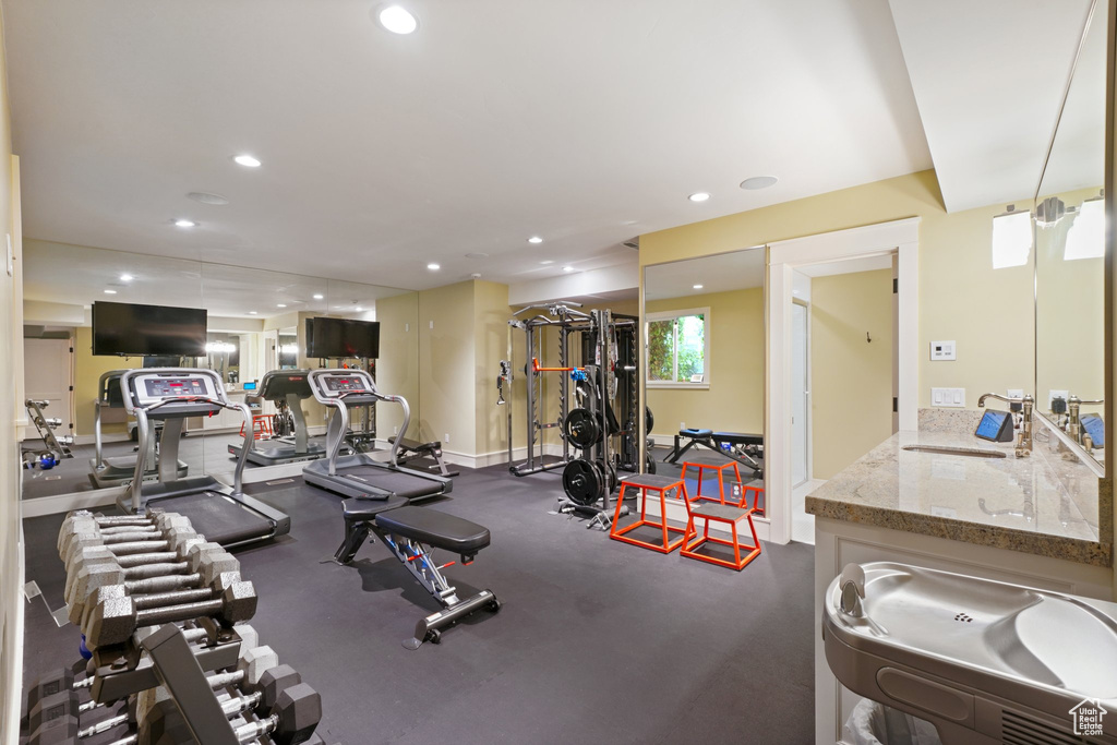 Exercise room featuring sink