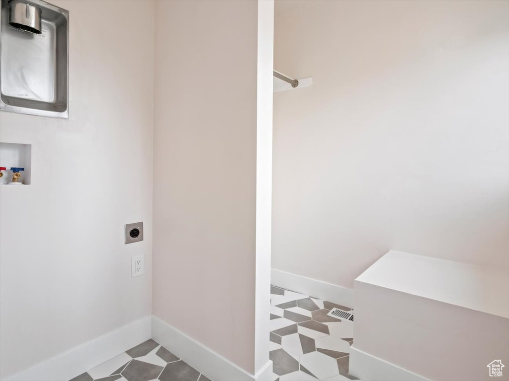 Bathroom featuring tile flooring