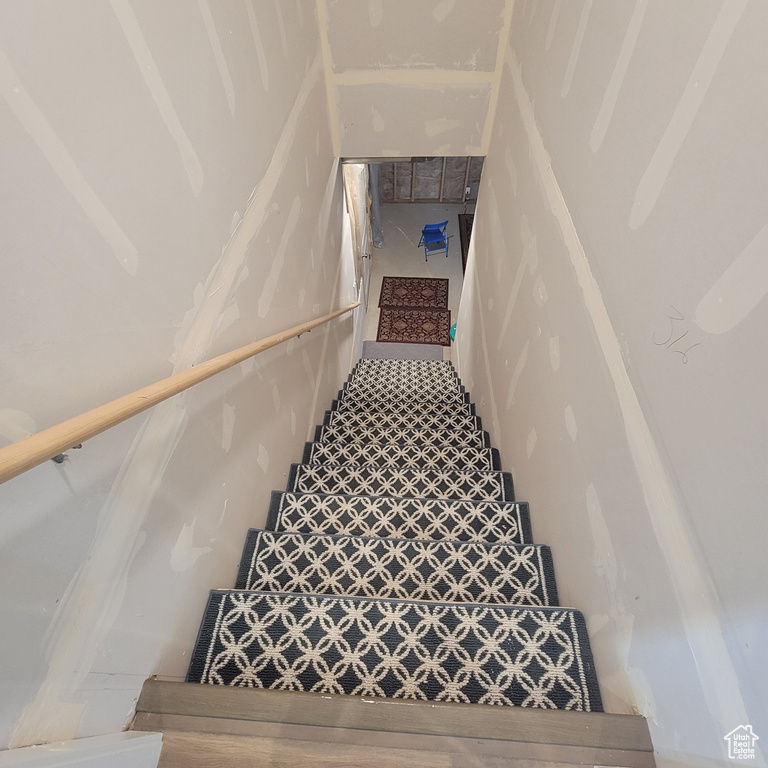 Stairway featuring tile flooring