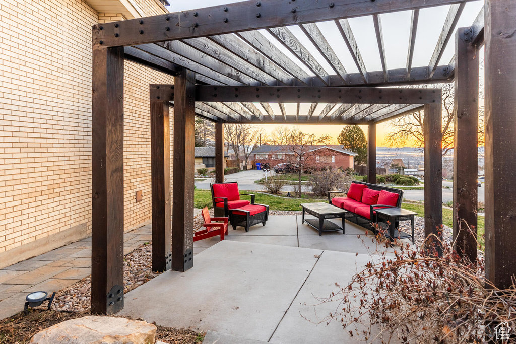 View of patio / terrace featuring a pergola and an outdoor hangout area
