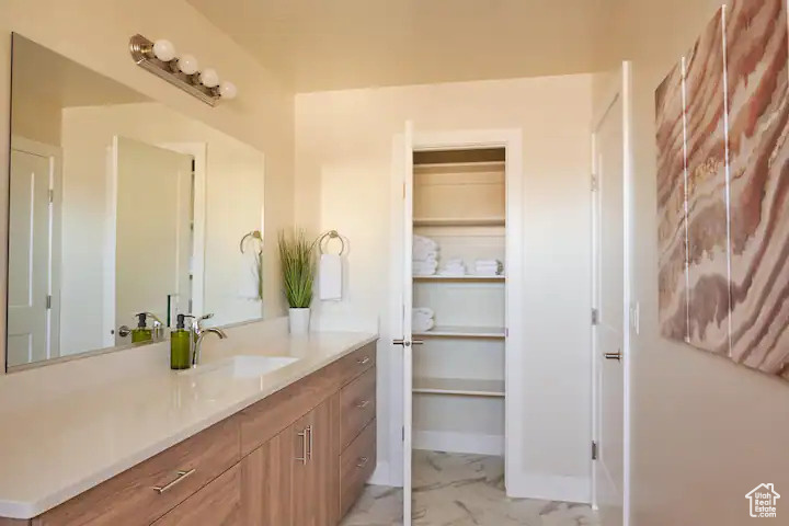 Bathroom with tile floors and vanity