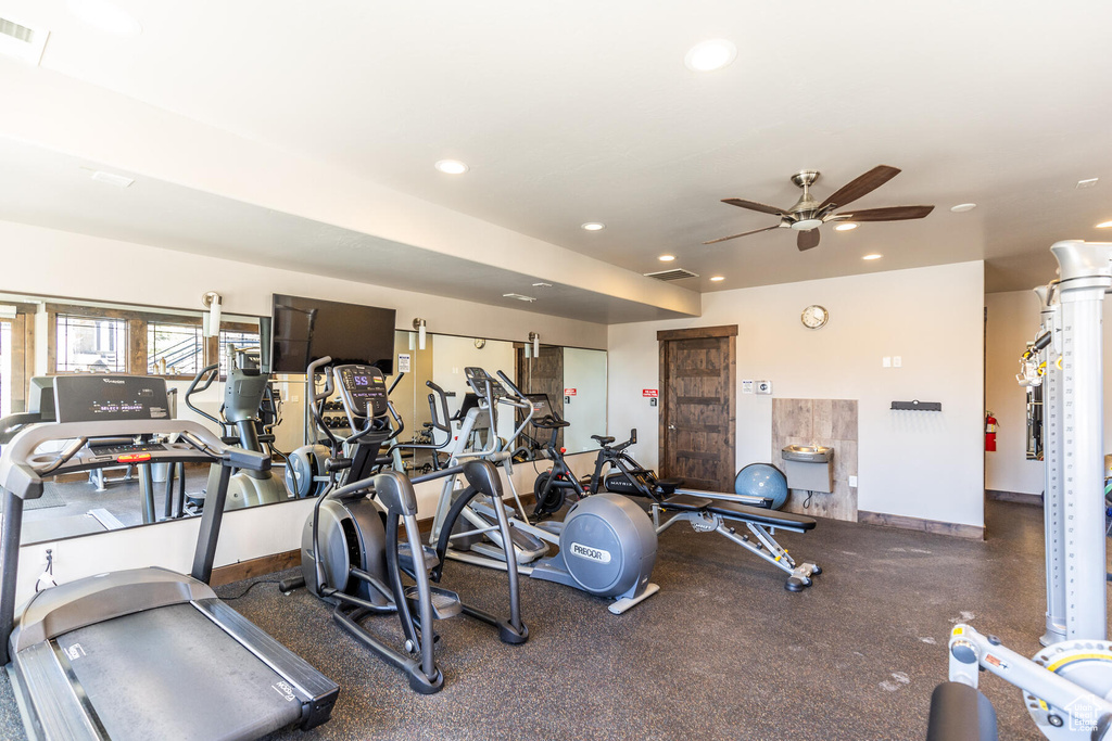 Workout area with ceiling fan
