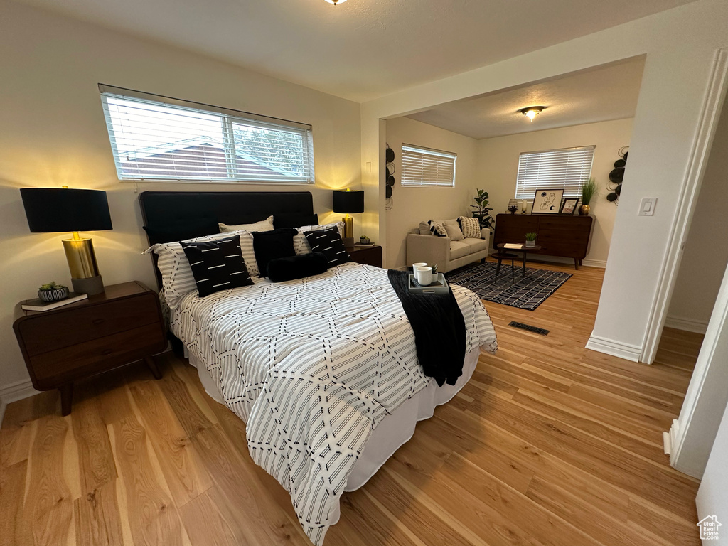 Bedroom with light wood-type flooring