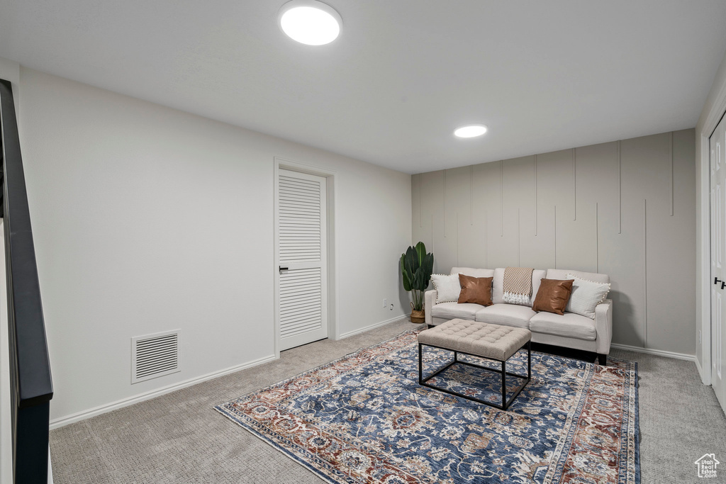 Interior space featuring light colored carpet