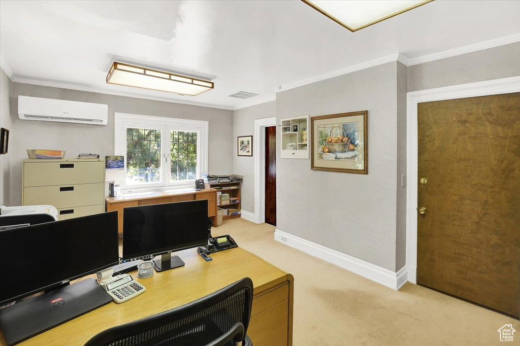Office featuring a wall unit AC, crown molding, and light carpet