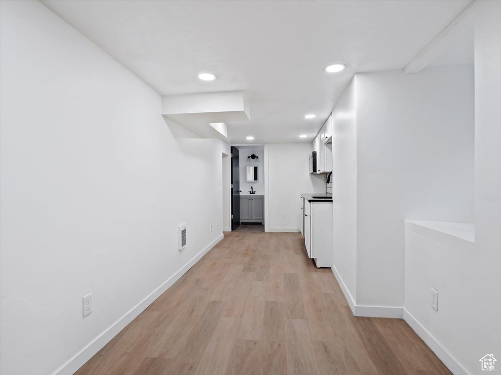 Hall featuring light hardwood / wood-style floors