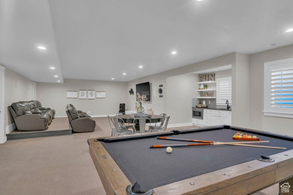 Rec room featuring sink, pool table, and carpet