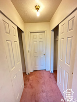 Hall with carpet floors