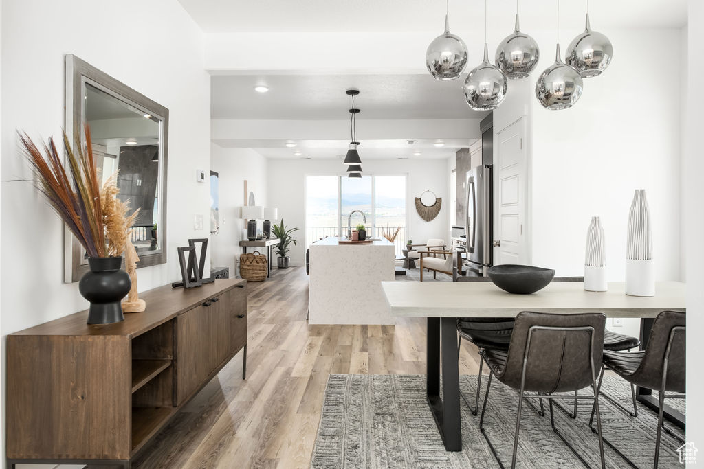 Dining space featuring light hardwood / wood-style floors