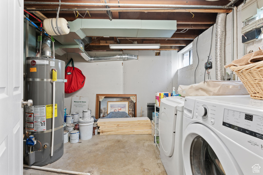 Laundry room with independent washer and dryer and secured water heater