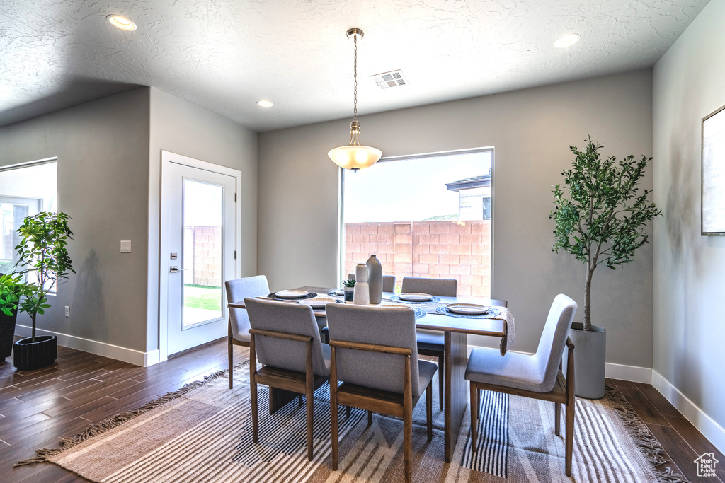 Dining room featuring dark hardwood / wood-style floors