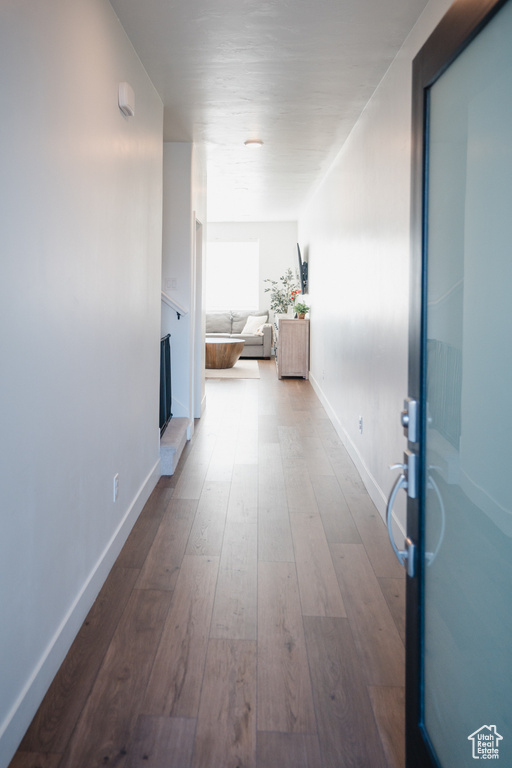 Corridor featuring light hardwood / wood-style floors