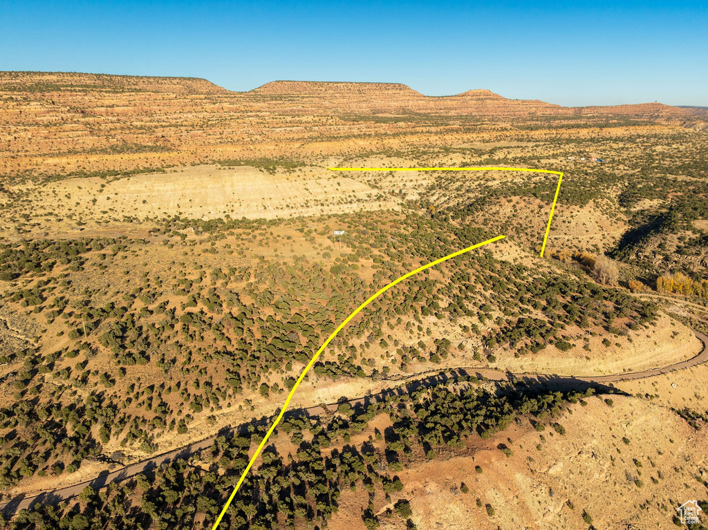 Birds eye view of property with a mountain view