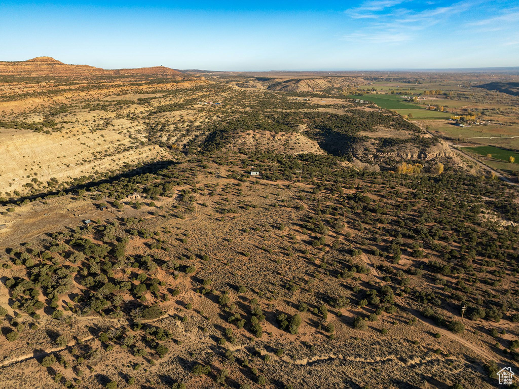 Birds eye view of property with a mountain view