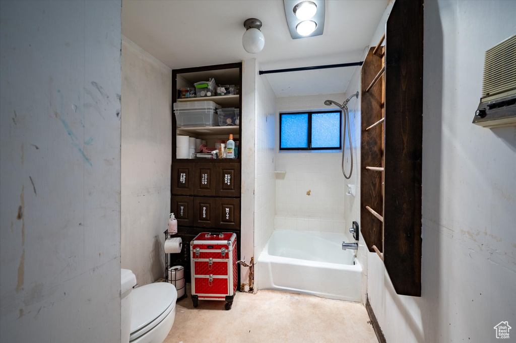 Bathroom featuring  shower combination and toilet
