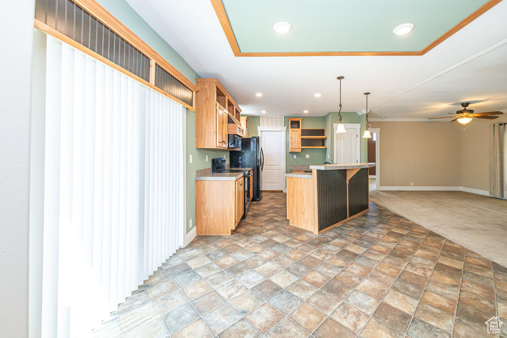 Kitchen with a center island, hanging light fixtures, ceiling fan, and light tile floors