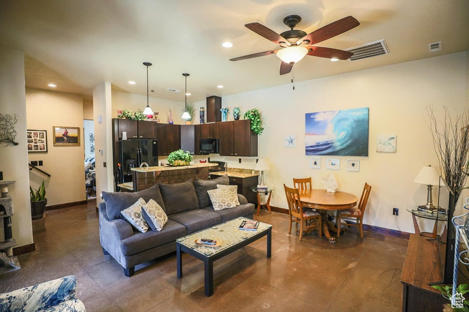 Tiled living room with ceiling fan