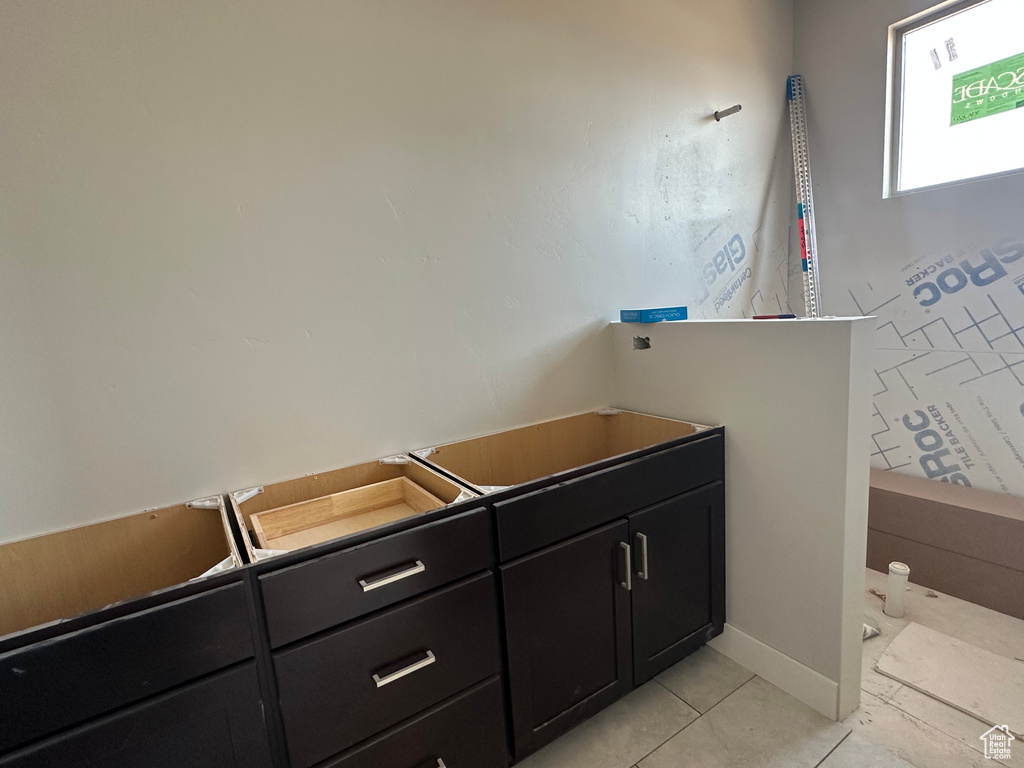 Bathroom with tile patterned floors