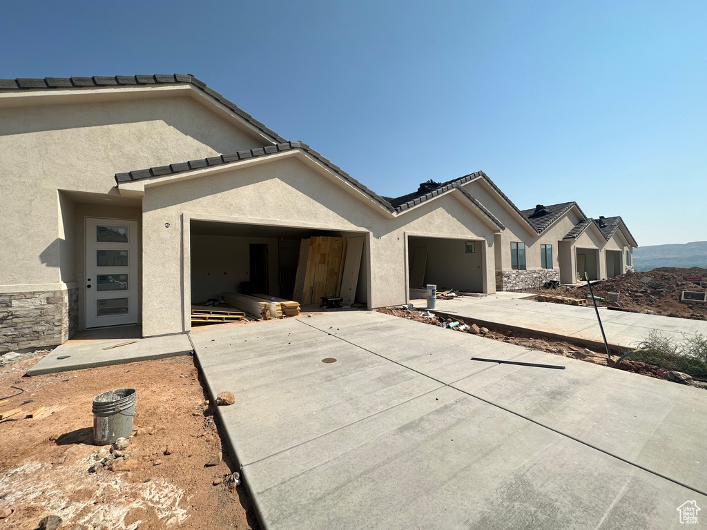 View of front facade with a patio