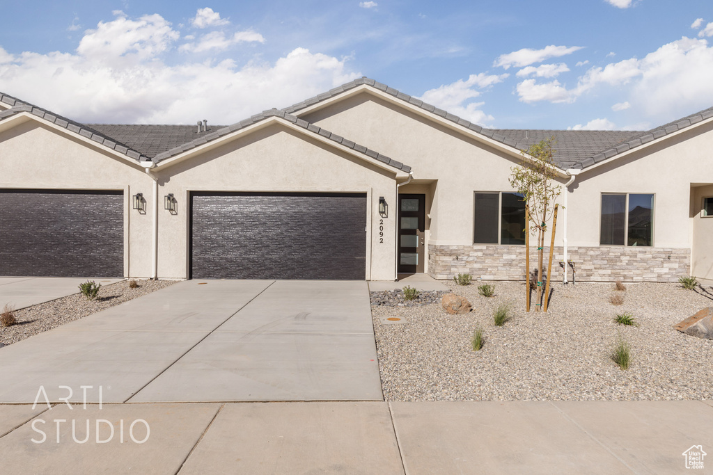 Single story home featuring a garage