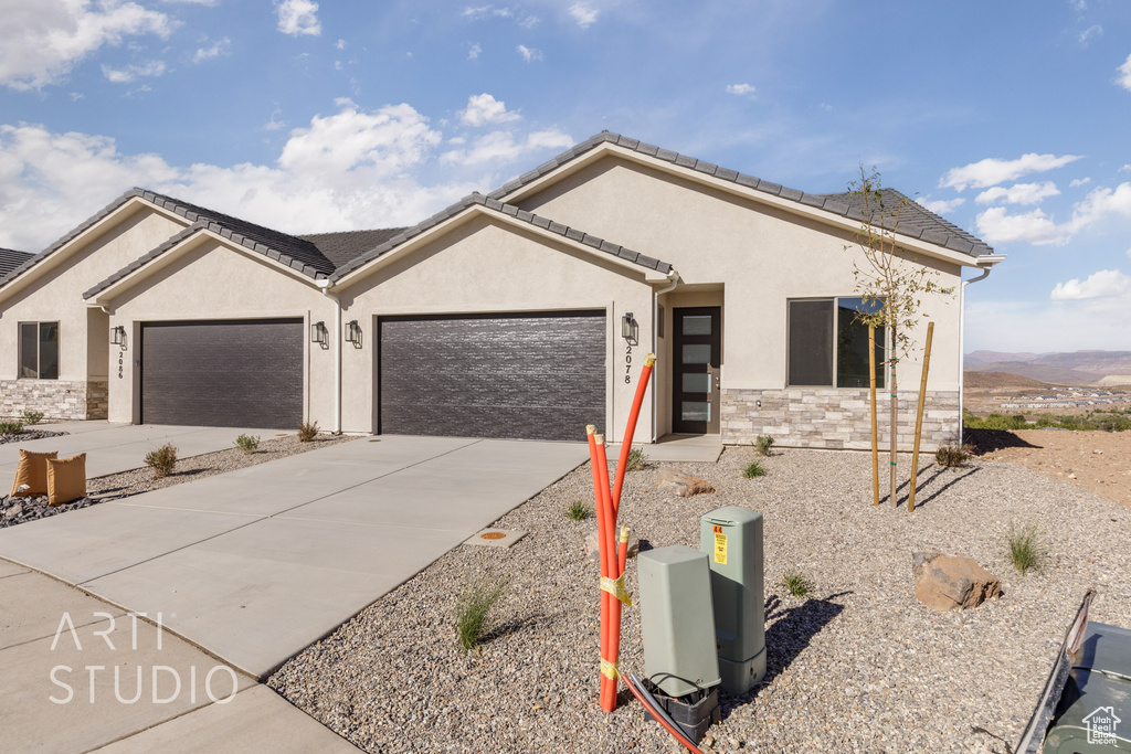 View of front facade with a garage