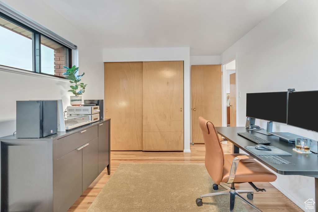 Home office featuring light hardwood / wood-style floors